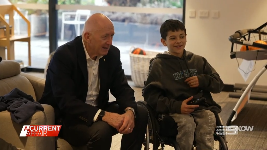 Sargood Foundation's Patron Sir Peter Cosgrove sits with young boy at Sargood on Collaroy for the very first Kids Camp.